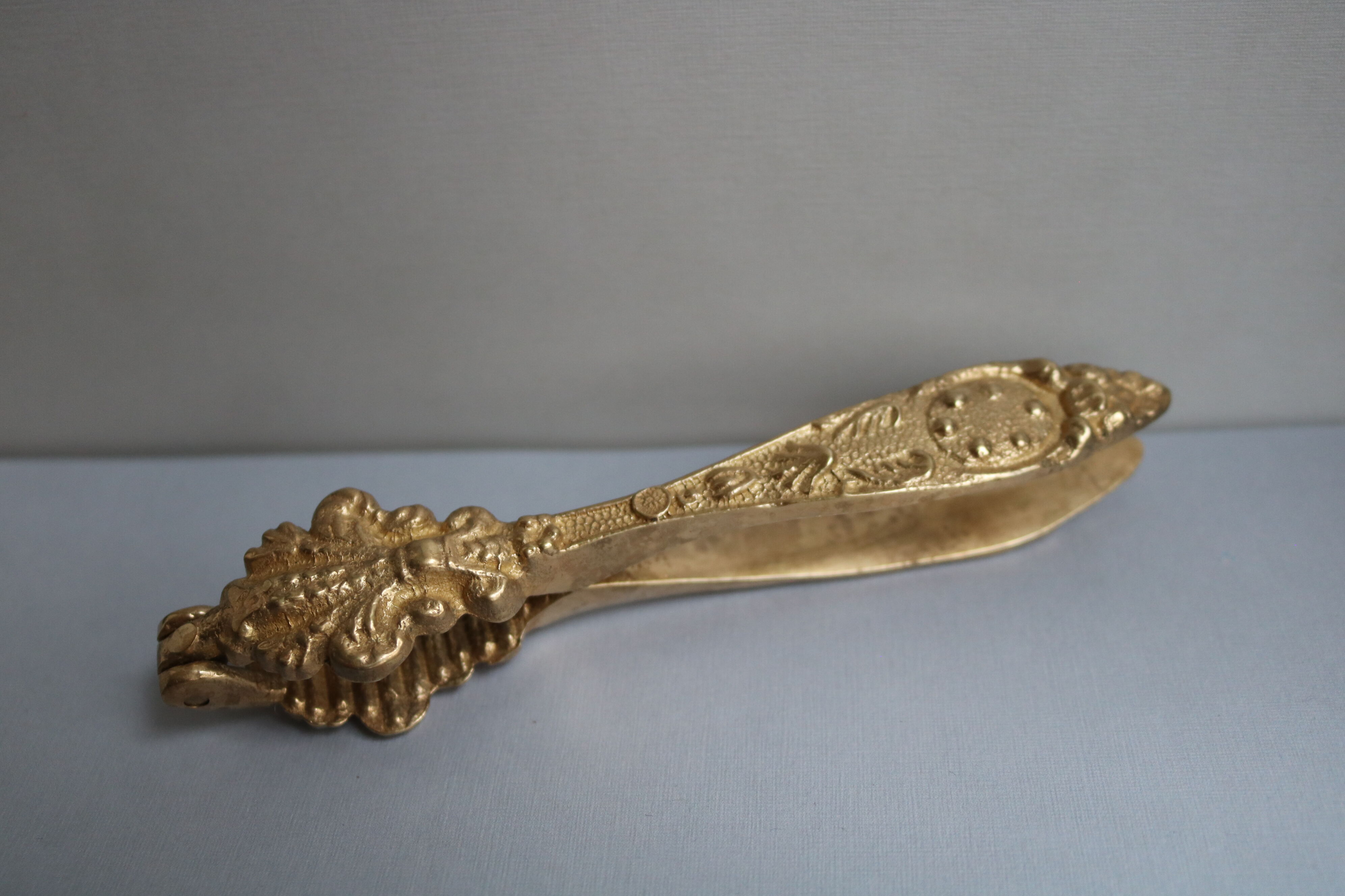 Vintage brass ornate nutcracker