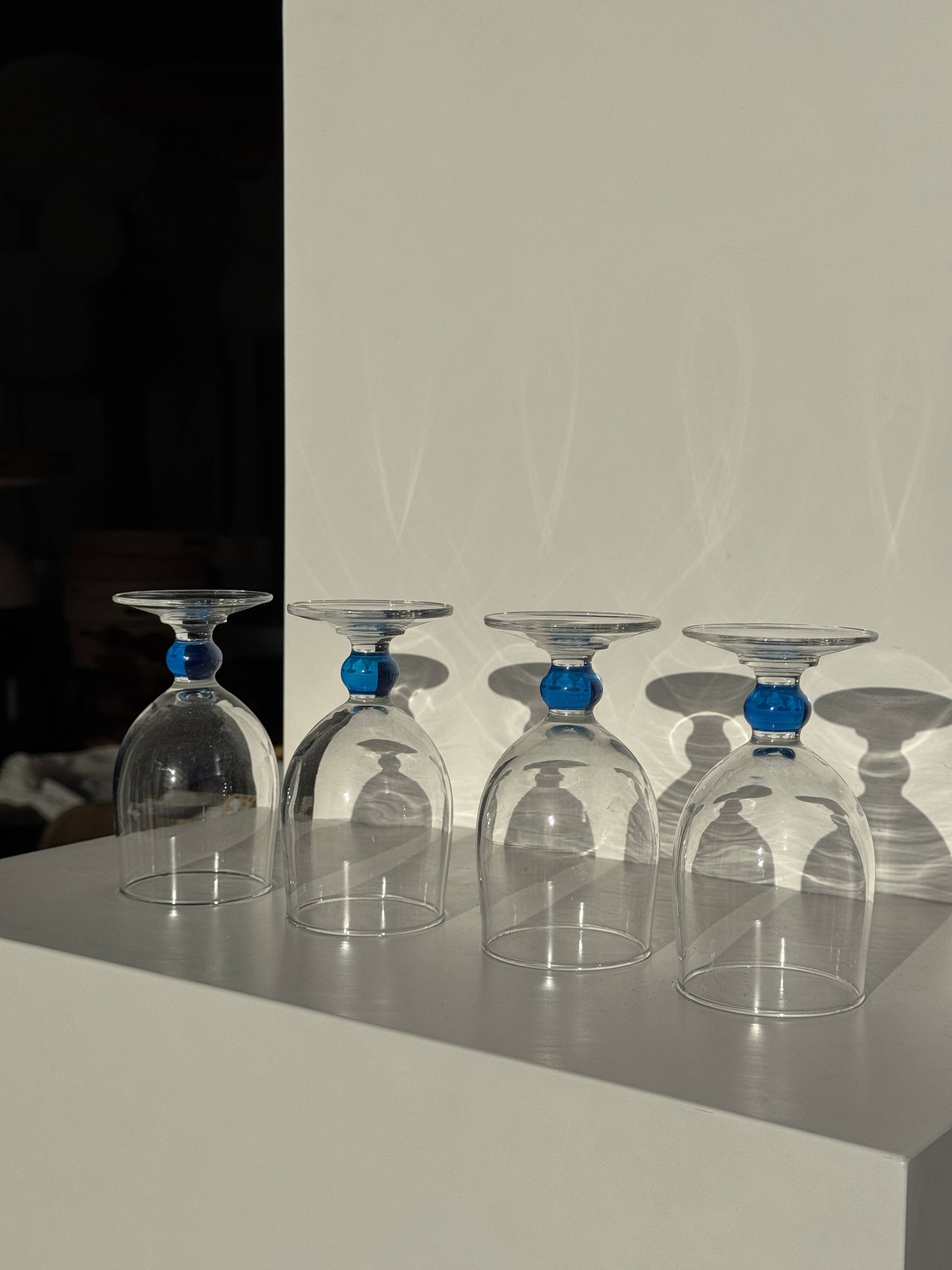 Set of 4 blue ball stemmed water glasses