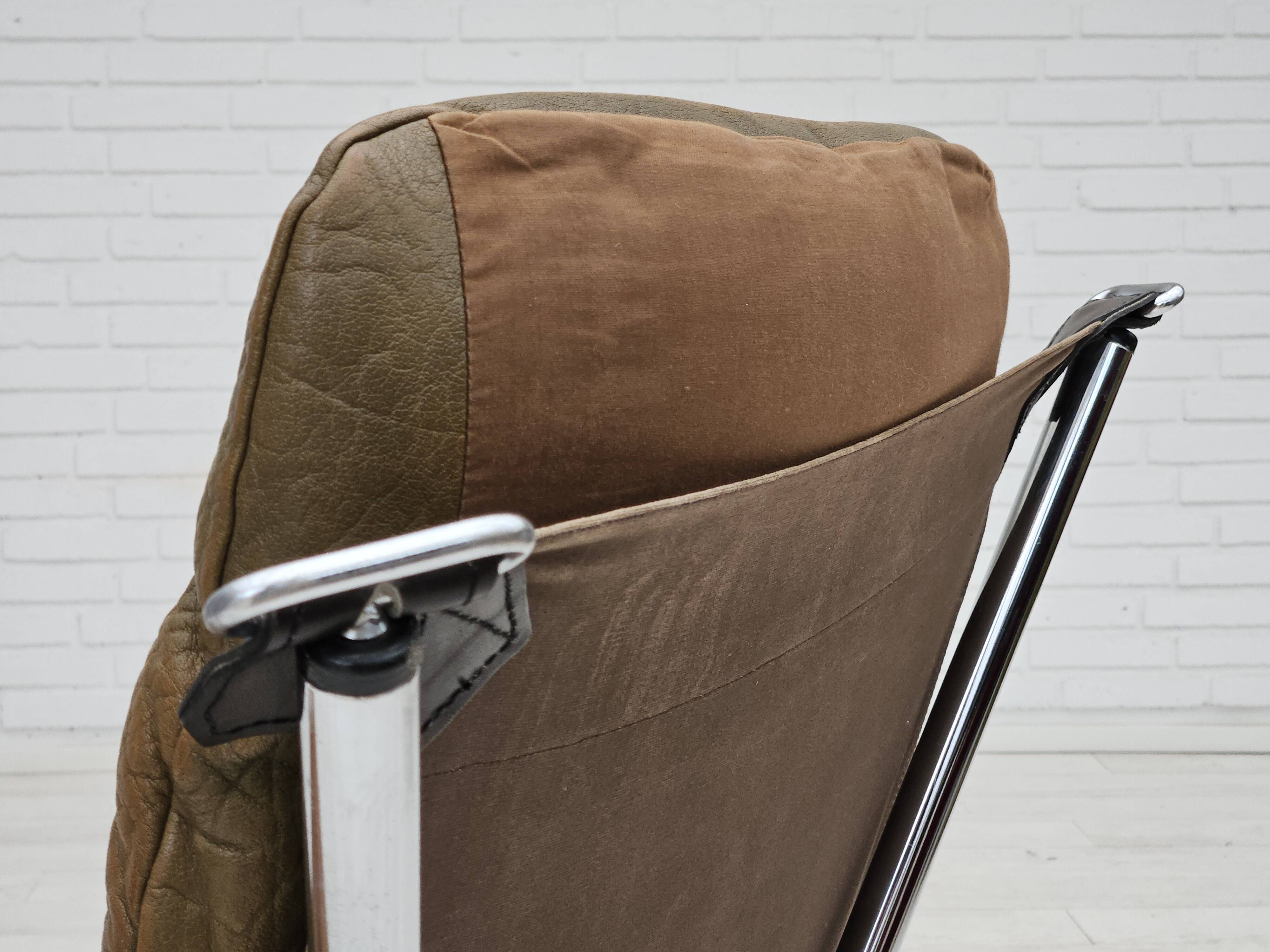 1970s, Norwegian design by Harald Relling, original condition, leather, chrome steel, teak wood.