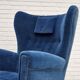 Années 1960, fauteuil relax danois à dossier haut, état d'origine, meuble en velours bleu.