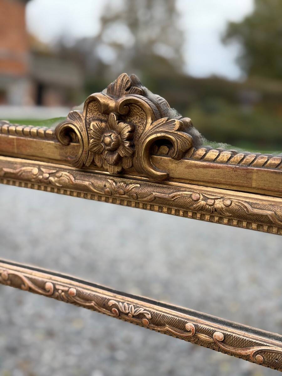 Regency style mirror in gilded wood, 19th century