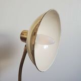 Golden hinged desk lamp