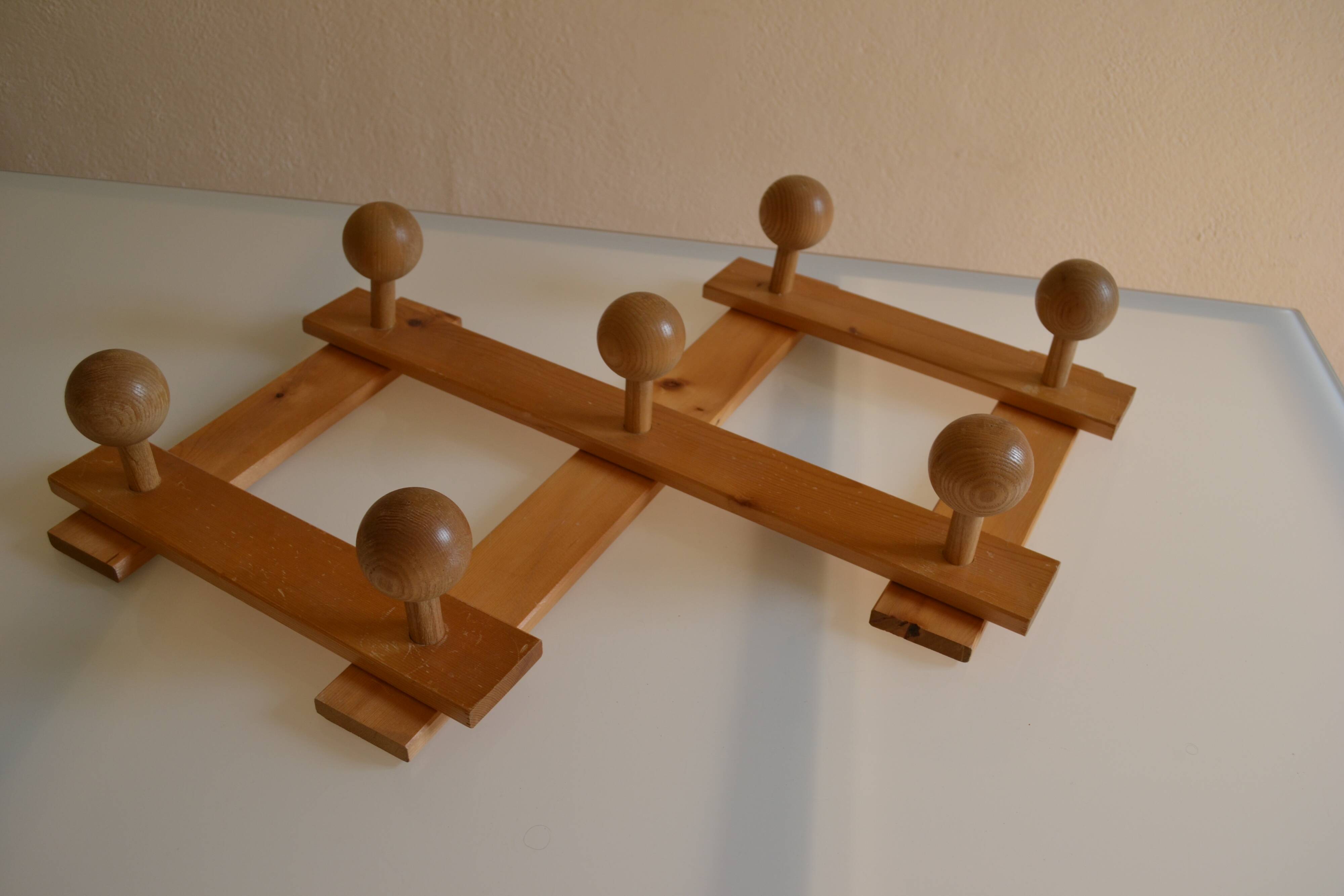 Brutalist wooden accordion wall coat rack with 7 hooks