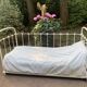 Wrought iron sofa bed with box spring.