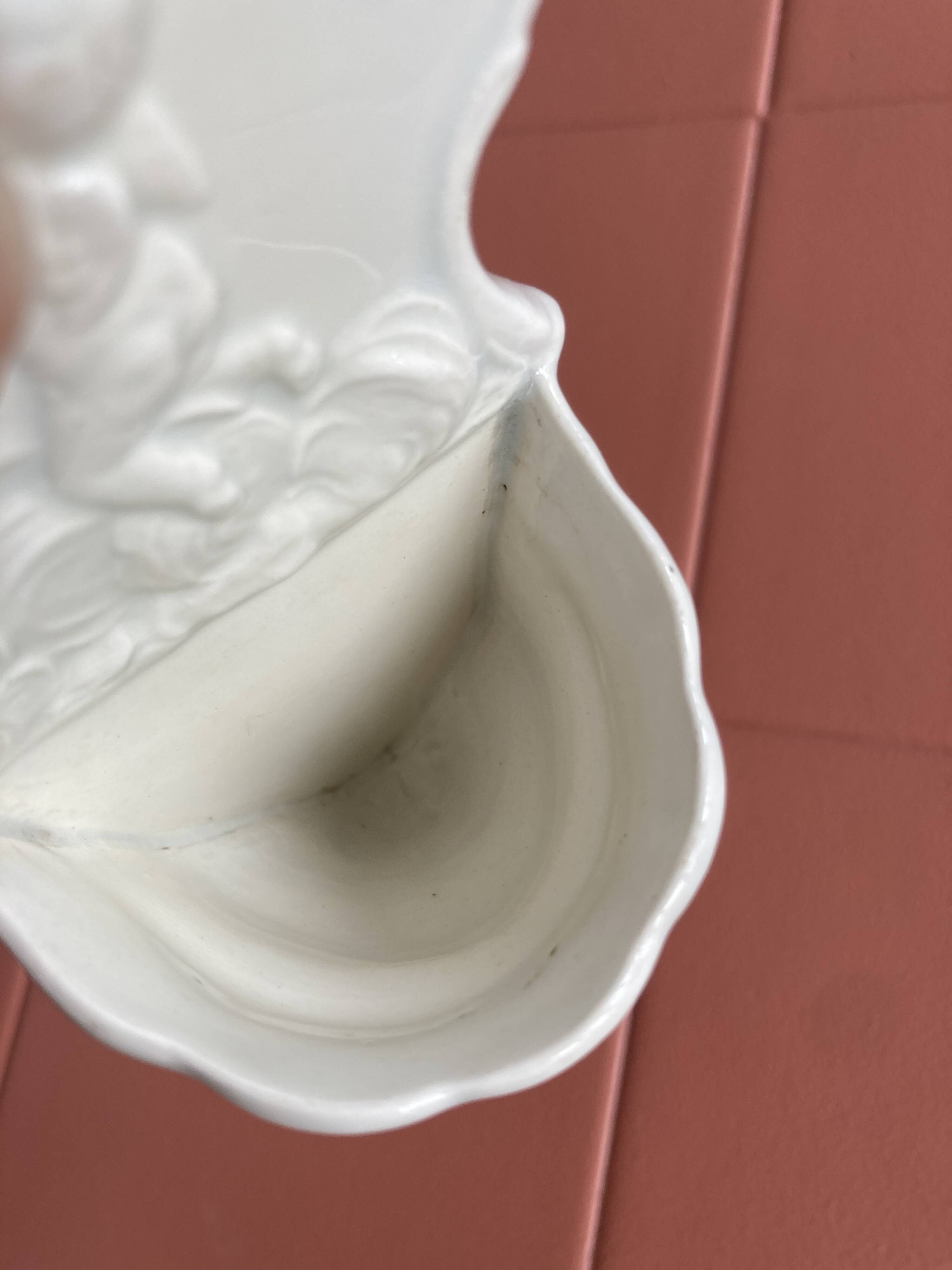 19th century porcelain angel holy water font