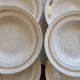 6 vintage ivory earthenware deep plates with double gold trim