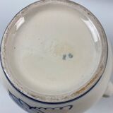 Ceramic pitcher decorated grapes