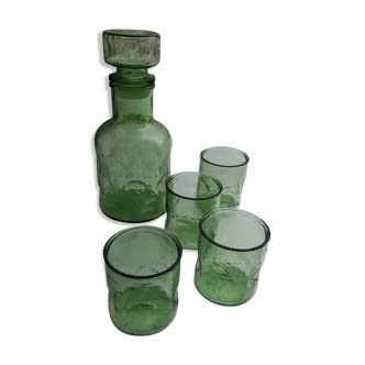 Green carafe in green bulb and assorted vintage glasses