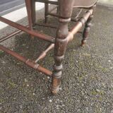 Pair of blackened wooden armchairs