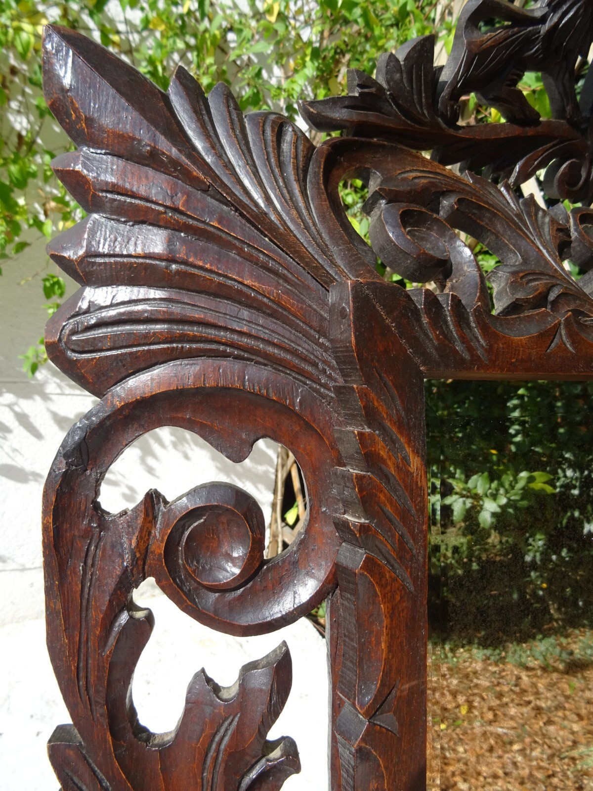 Miroir sculpté fronton lions