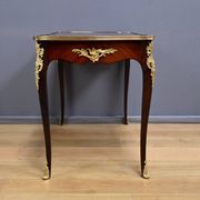 Rosewood, mahogany, and rosewood desk-table, Louis XV style – early 20th century.