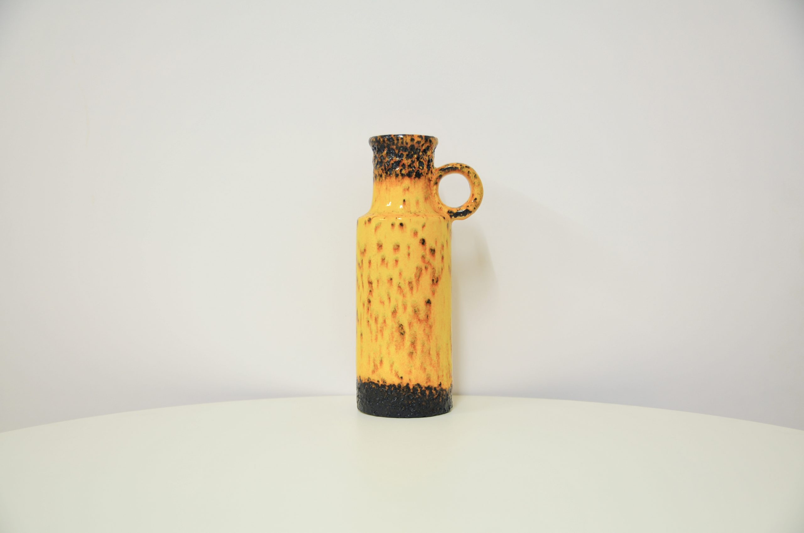 Vintage yellow and brown fatlava jug
