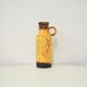 Vintage yellow and brown fatlava jug