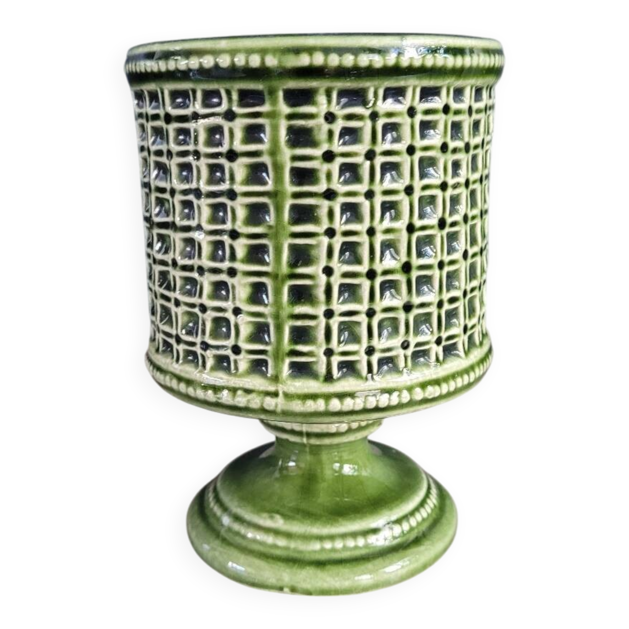 Green glazed ceramic flowerpot on stand