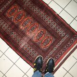 Tapis Vintage Bukhara en Laine, Années 1960, Authenticité et Tradition