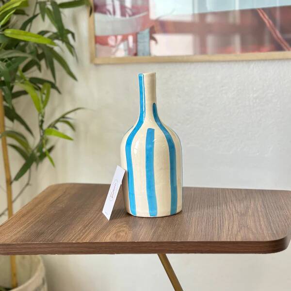 Artisanal vase, sky blue striped bottle.