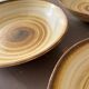Lot de 4 assiettes creuses signées Longchamp