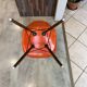 A vintage 70s Eames Herman Miller DSW Fiber Red Orange Dowel Walnut Chair