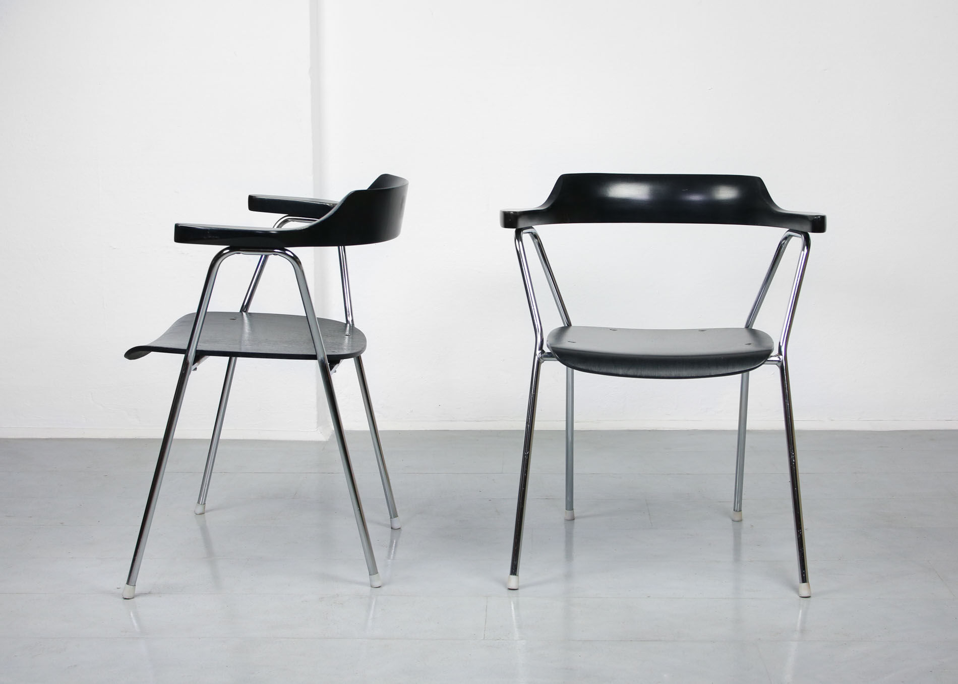 Black model 4455 dining armchairs by Niko Kralj