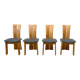 Set of four sculptural brutalist oak chairs