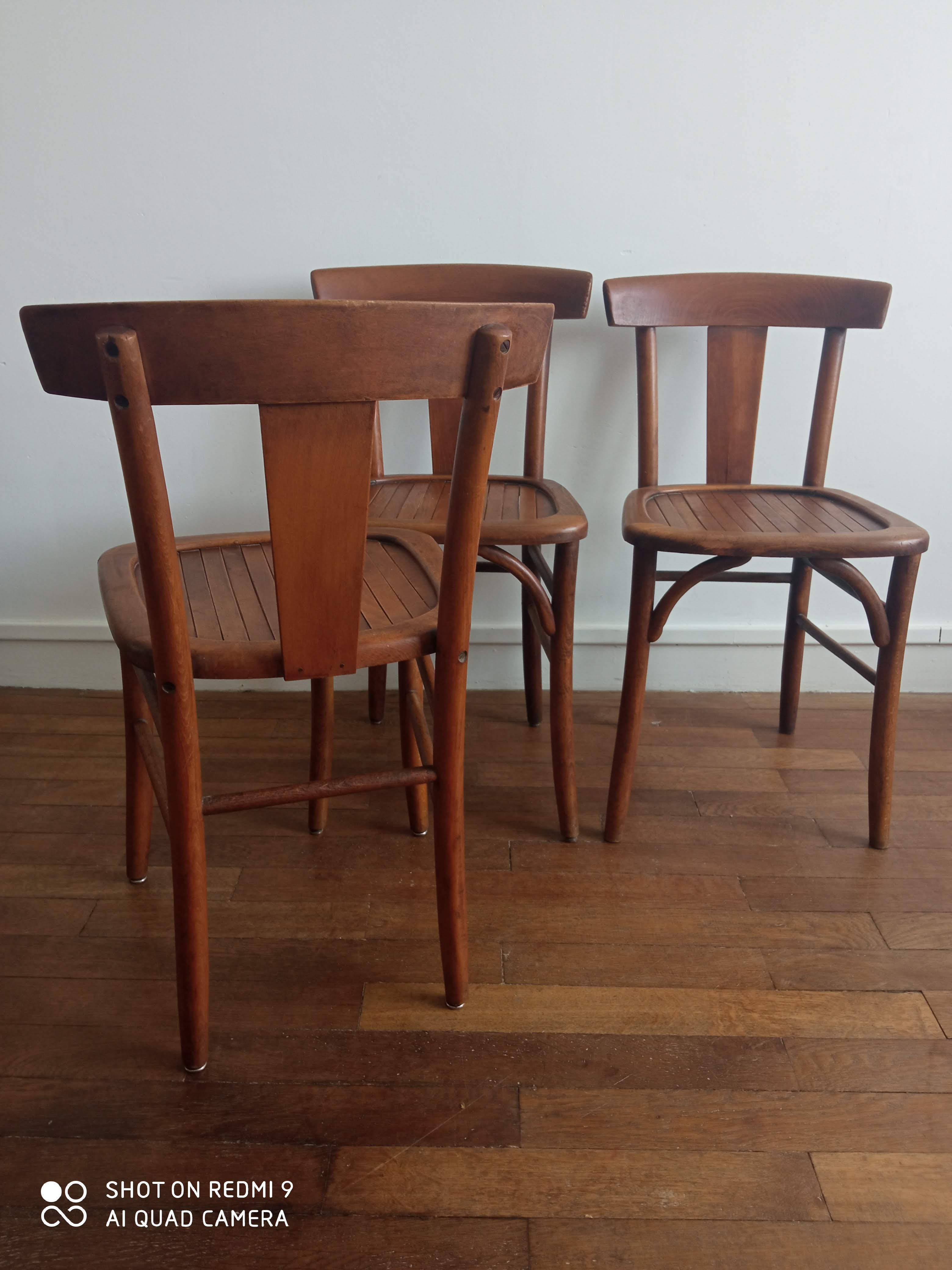 Trio of old bistro chairs