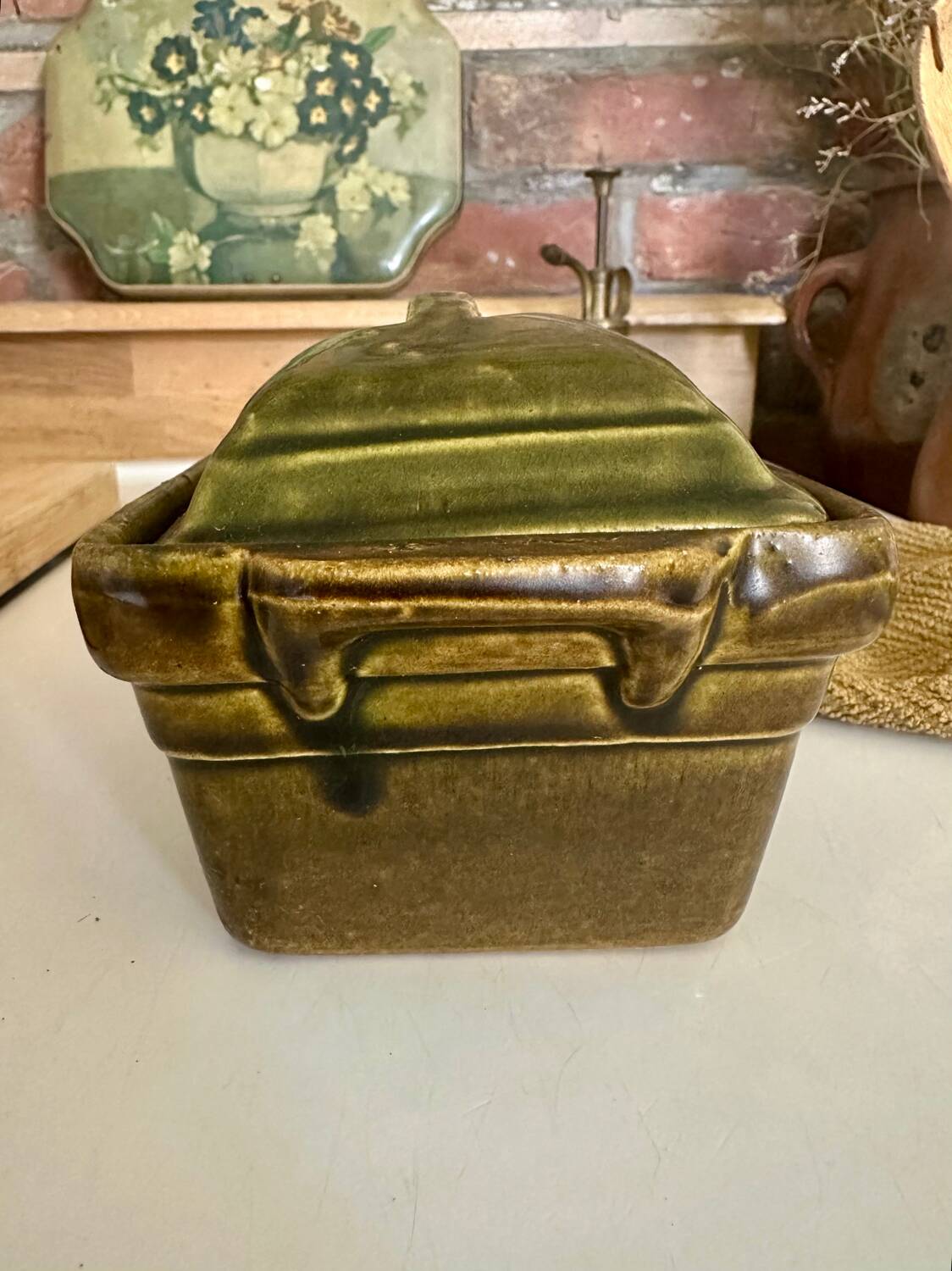Vintage green majolica butter dish