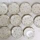 11 plates in antique earthenware decorated with golden leaves and golden border