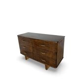 A vintage Italian chest of drawers, made of veneered walnut and solid wood,