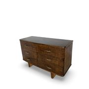 A vintage Italian chest of drawers, made of veneered walnut and solid wood,