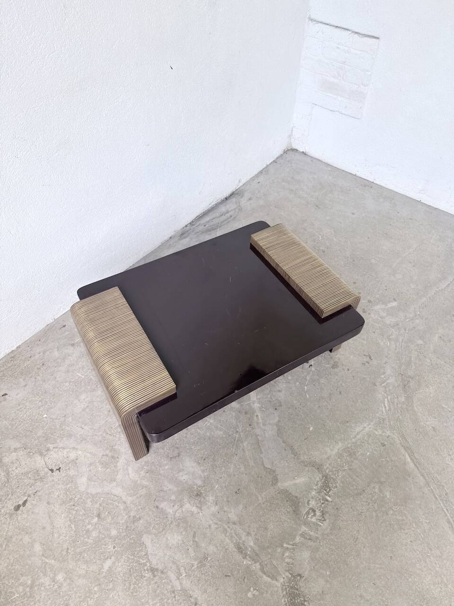 Art Deco coffee table in lacquer and brass