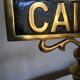 Brass Cash brewery counter plate on foot