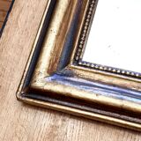 Antique Louis-Philippe gilded mirror “Apoline”