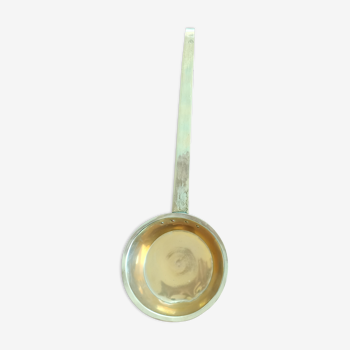 Old brass ladle