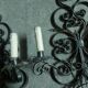 Two large wrought iron wall lights