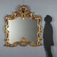 Miroir ancien en bois sculpté et doré, Italie, début XXe siècle