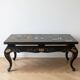Black lacquered Chinese coffee table, 20th century.