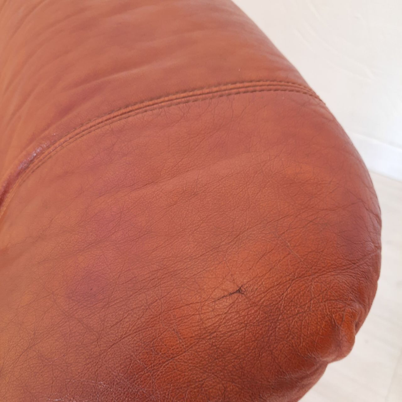 Four vintage armchairs, leather and fabric, 70s