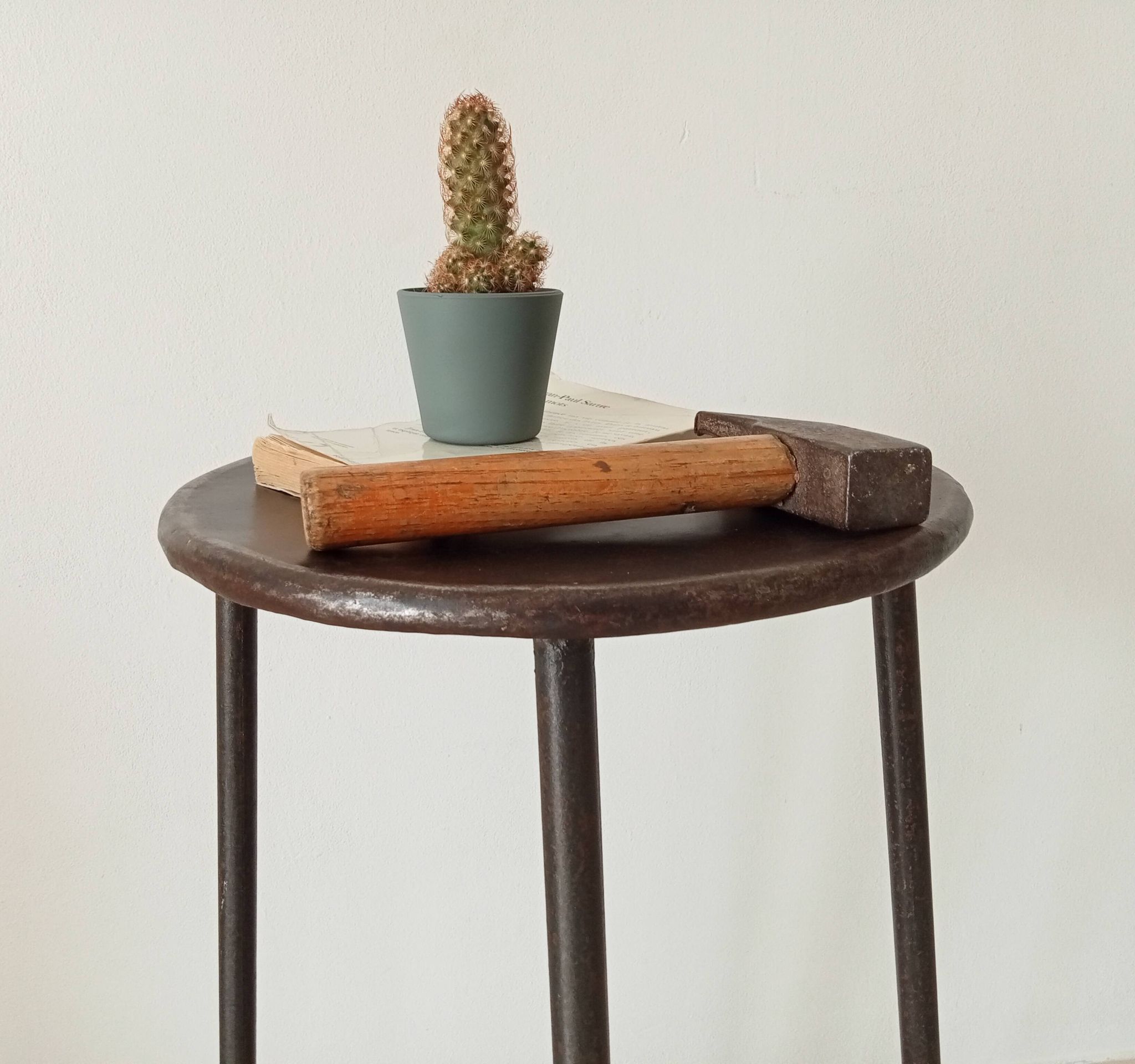 Brutalist high stool from the 1960s in solid steel.