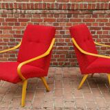 Pair of red armchairs model 6953 by Jaroslav Smidek published by TON