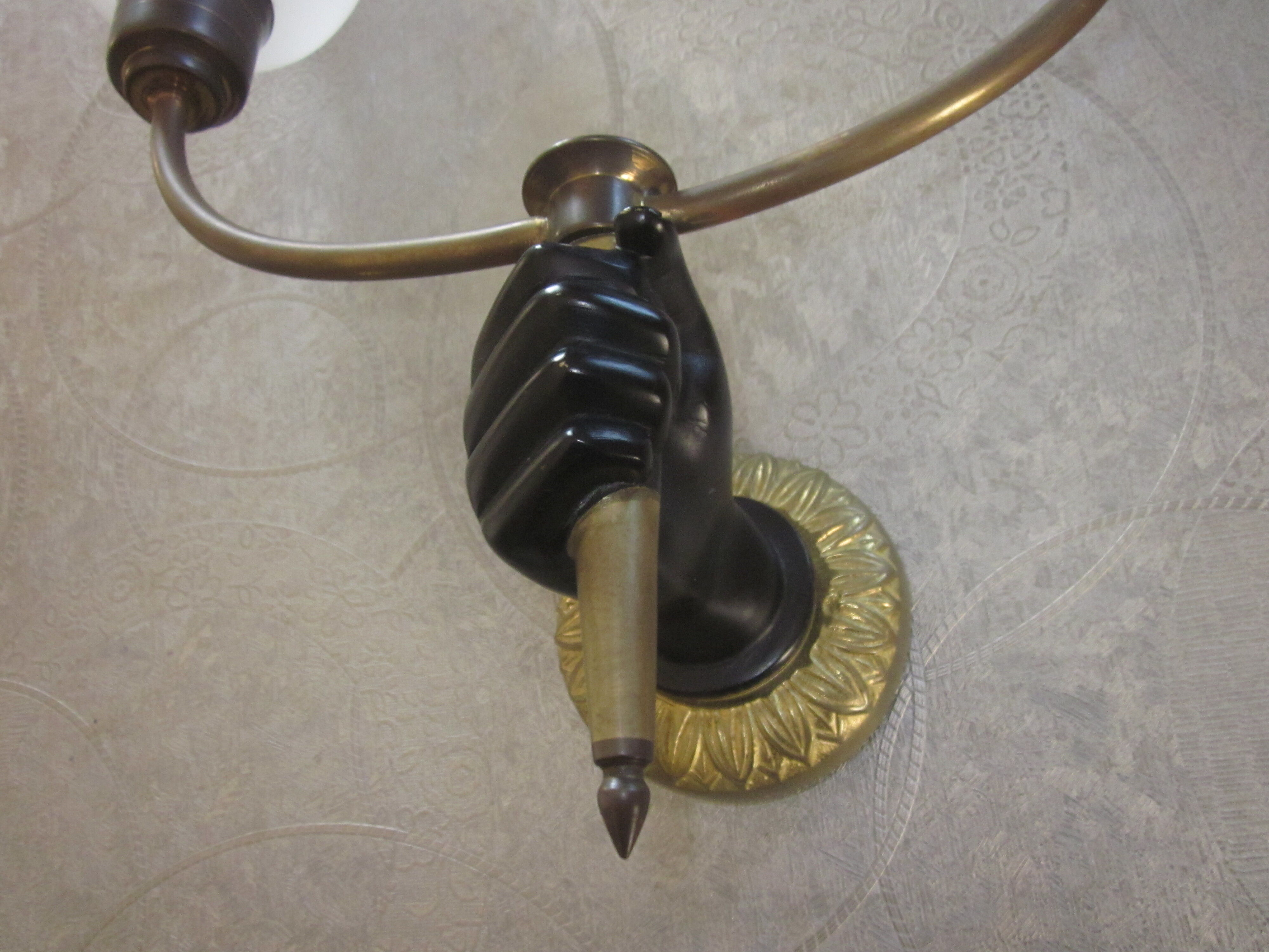 Applique main en bronze