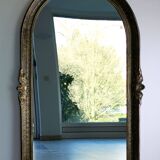 Baroque “trumeaux” mirror in carved solid wood.
