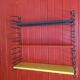 Tomado string shelf