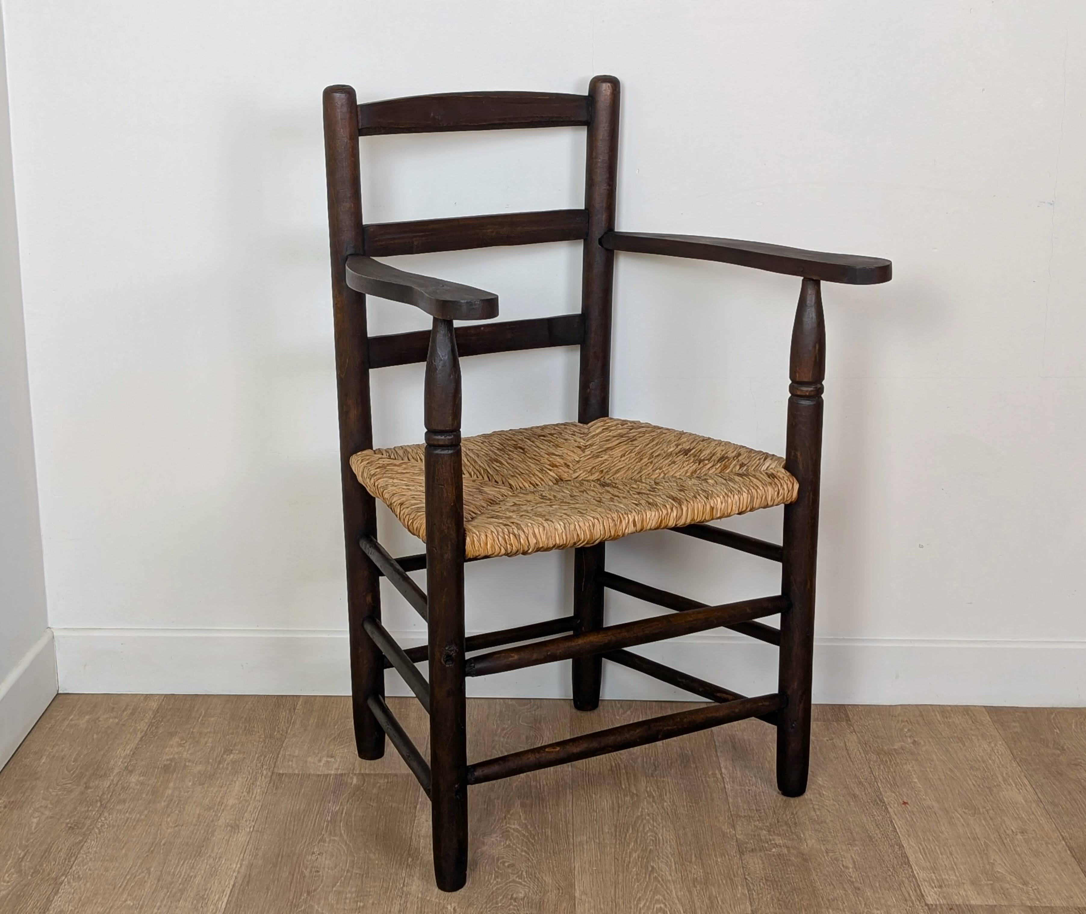 Wooden straw armchair