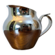 Antique stainless steel milk jug by Remy Letang