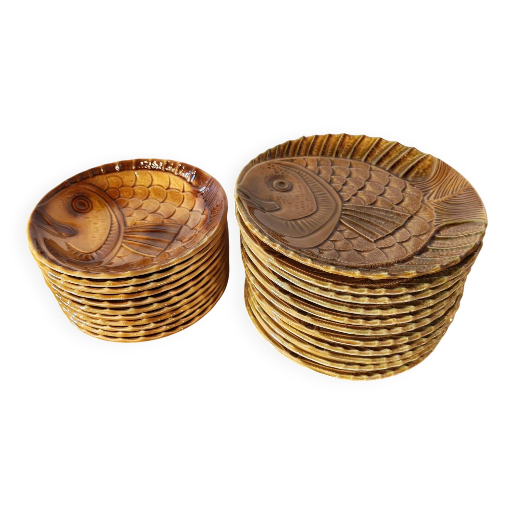Vintage barbotine plates with fish decoration, 22 pieces.