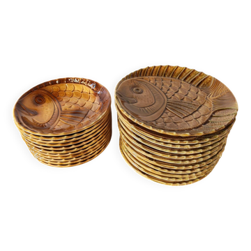 Vintage barbotine plates with fish decoration, 22 pieces.