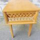 Vintage wood and rattan bedside table