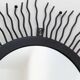 Black metal sunburst wall mirror, round 63x63 cm, vintage 1990s, made in Italy