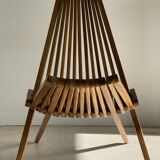 Foldable designer armchair in wooden slats