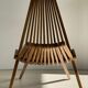Foldable designer armchair in wooden slats